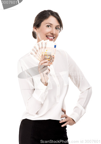 Image of Woman holding euro currency notes