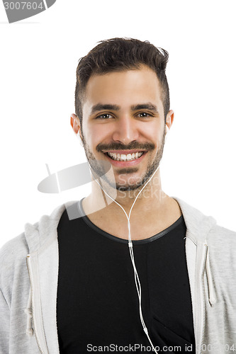 Image of Man smiling and listen music