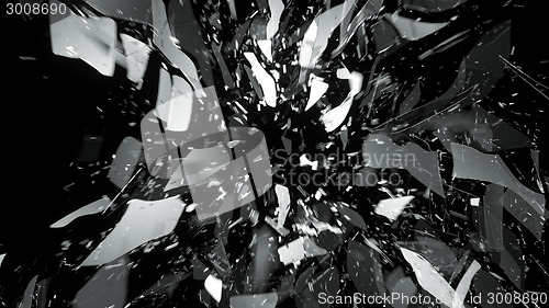 Image of glass breaking with motion blur on black