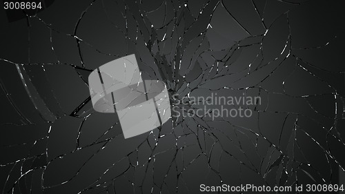 Image of Shattered and destructed glass on black