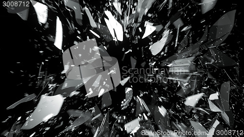 Image of Destructed or demolished glass on black with motion blur