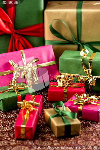 Image of Nine Wrapped Presents in Plain Colors
