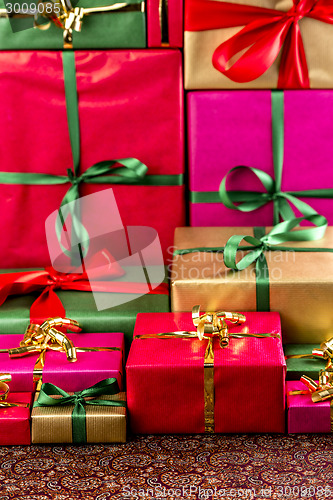 Image of Towering Stack of Gifts

