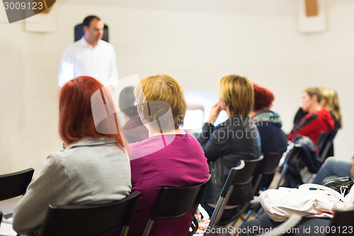 Image of Speaker at Business Workshop. 