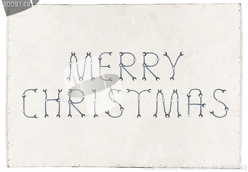 Image of Merry Christmas greetings slogan on plywood board