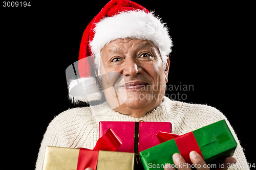 Image of Puzzled Old Gentleman Carrying Three Wrapped Gifts