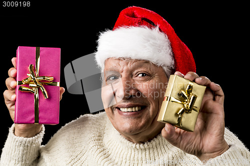 Image of Happy Male Senior Showing Two Wrapped Presents