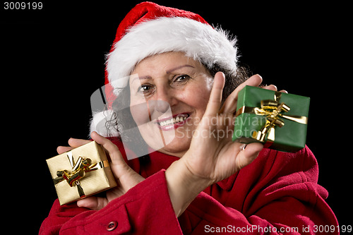 Image of Smiling Female Senior Showing Two Wrapped Gifts
