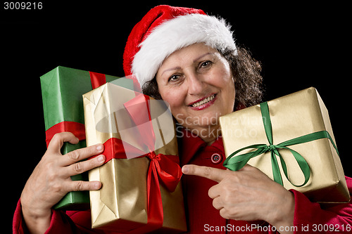 Image of Elderly Woman with Three Wrapped Christmas Gifts
