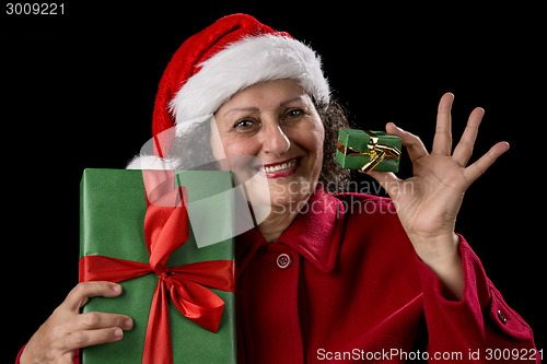 Image of Smiling Old Woman Offering a Small and a Big Gift
