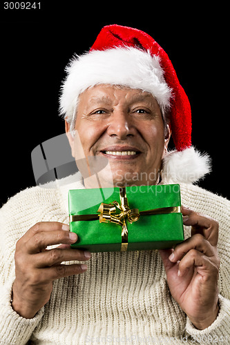 Image of Smiling Old Man Handing Over A Wrapped Green Gift