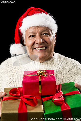 Image of Aged Man Offering Three Wrapped Christmas Presents