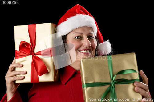 Image of Cheerful Old Lady with Two Wrapped Golden Gifts 
