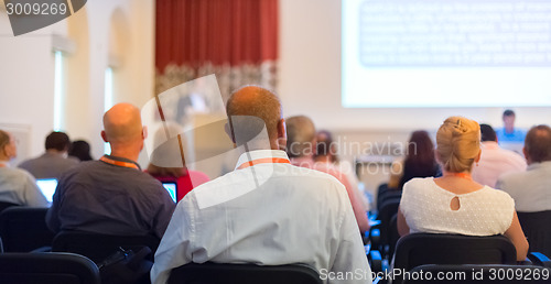 Image of Speaker at Business Conference and Presentation.