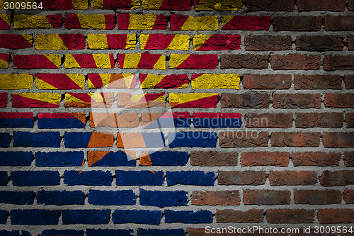 Image of Brick wall texture with flag