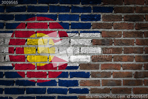 Image of Brick wall texture with flag