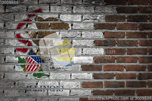 Image of Brick wall texture with flag