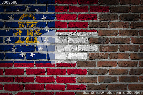 Image of Brick wall texture with flag