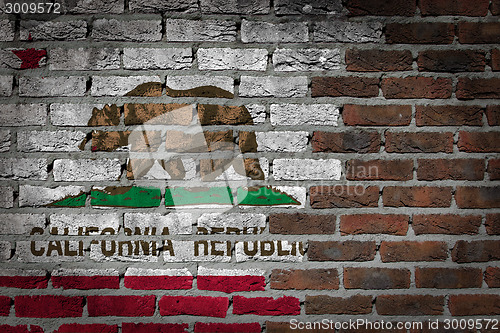 Image of Brick wall texture with flag