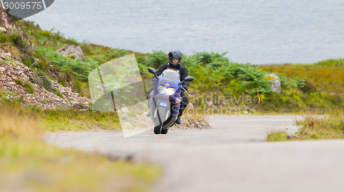 Image of Motorcyclist in the Scottish Highlands