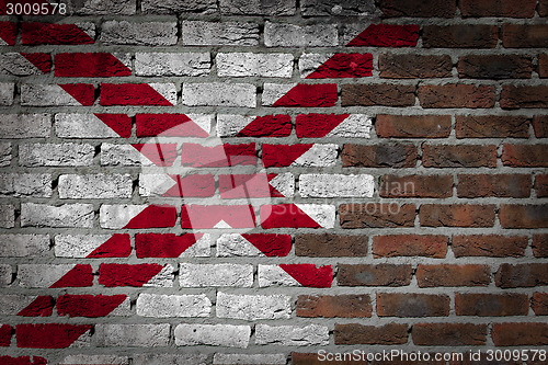 Image of Brick wall texture with flag