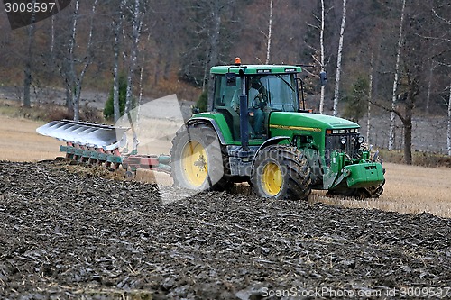 Image of John Deere 8100 Agricultural Tractor and Kverneland PB100 Plough