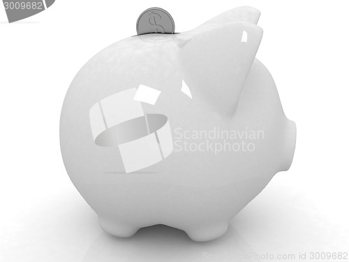 Image of glass piggy bank and falling coins