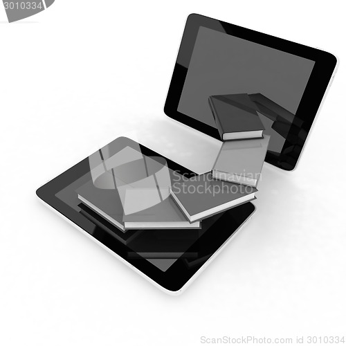 Image of tablet pc and colorful real books