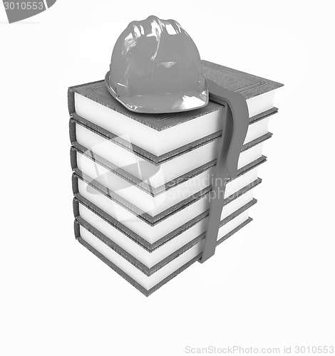 Image of Stack of leather technical book with belt and hard hat