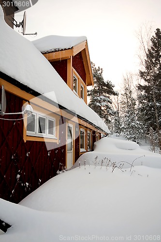 Image of house in snow