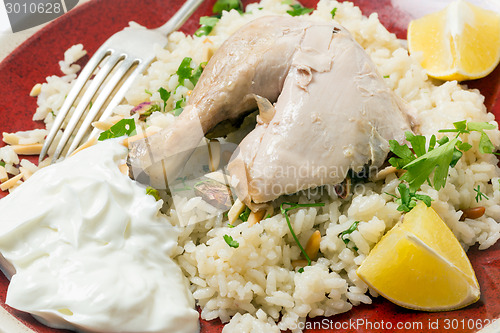 Image of Chicken pilaf with fork closeup