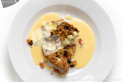 Image of college pudding and custard from above