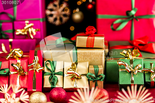 Image of Many Christmas Presents Grouped by Color