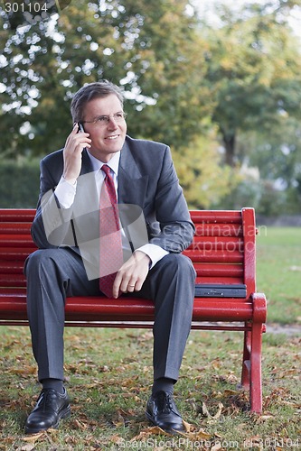 Image of Businessman with cell phone