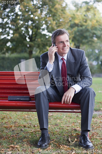 Image of Businessman with cell phone