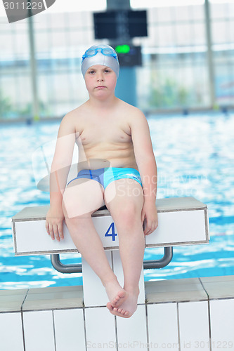 Image of child portrait on swimming pool