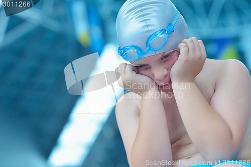 Image of child portrait on swimming pool