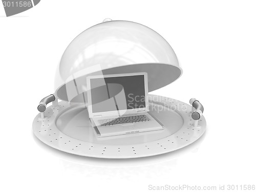 Image of Restaurant cloche and laptop with open lid 