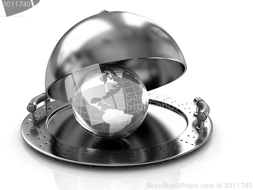 Image of Earth globe on glossy golden salver dish under a golden cover