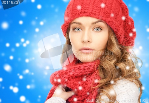 Image of close up of young woman in winter clothes