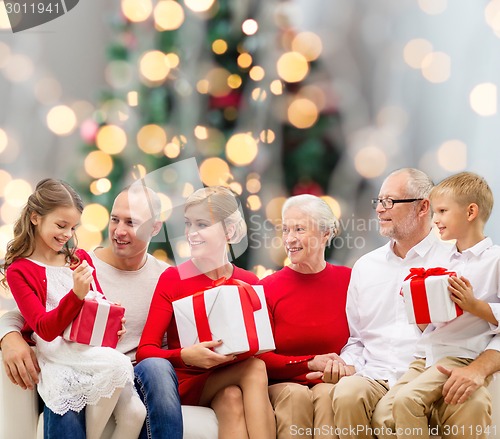 Image of smiling family with gifts