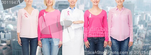 Image of close up of women with cancer awareness ribbons