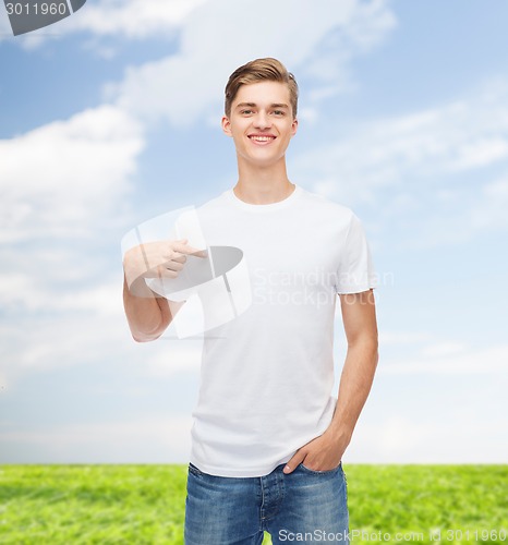 Image of smiling young man in blank white t-shirt