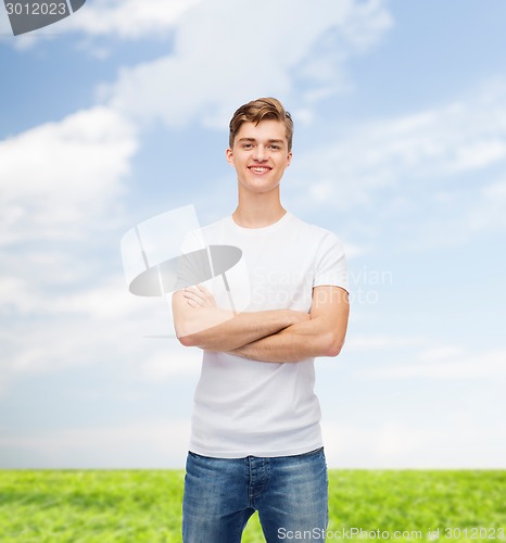 Image of smiling young man in blank white t-shirt