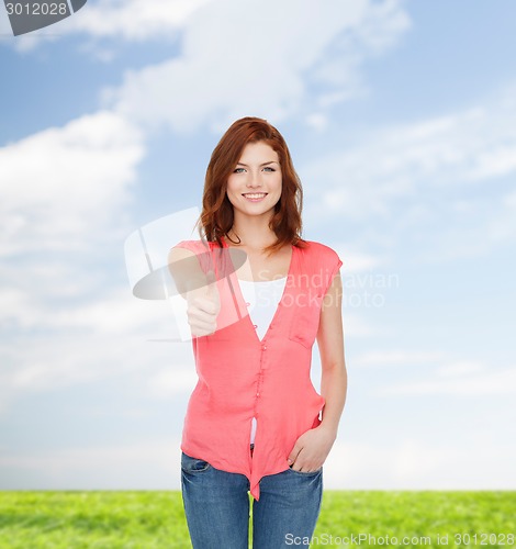 Image of smiling teenage girl in casual clothes