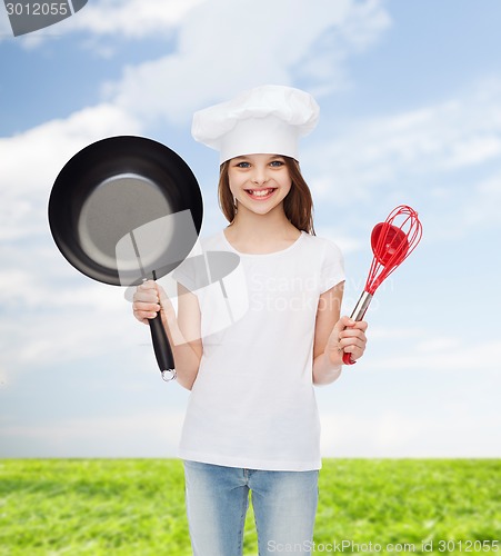 Image of smiling little girl in white blank t-shirt