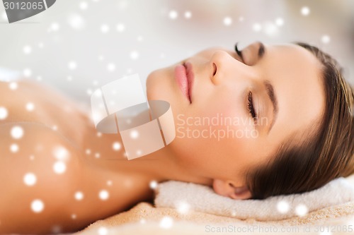 Image of beautiful young woman in spa