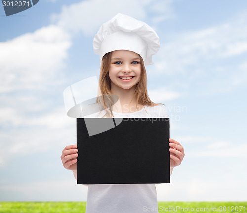 Image of little cook or baker with blank black paper