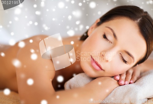 Image of beautiful young woman in spa