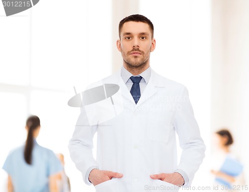 Image of male doctor in white coat
